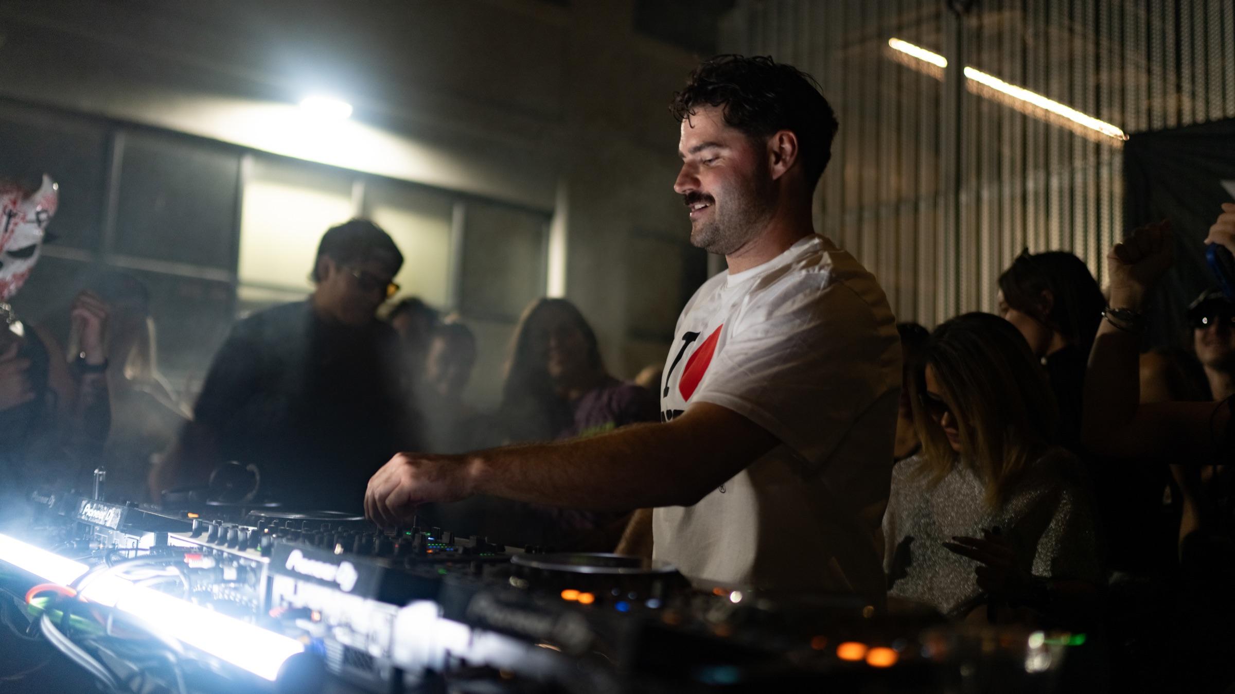 DJ mixing, LED light across the decks
