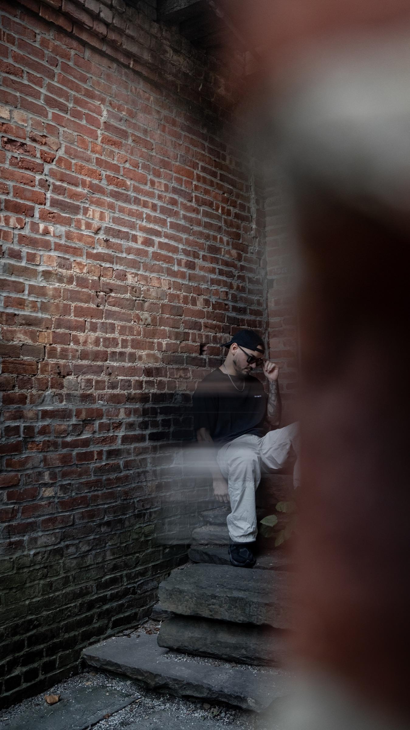 Medina on the steps, blurred brick edge in the foreground