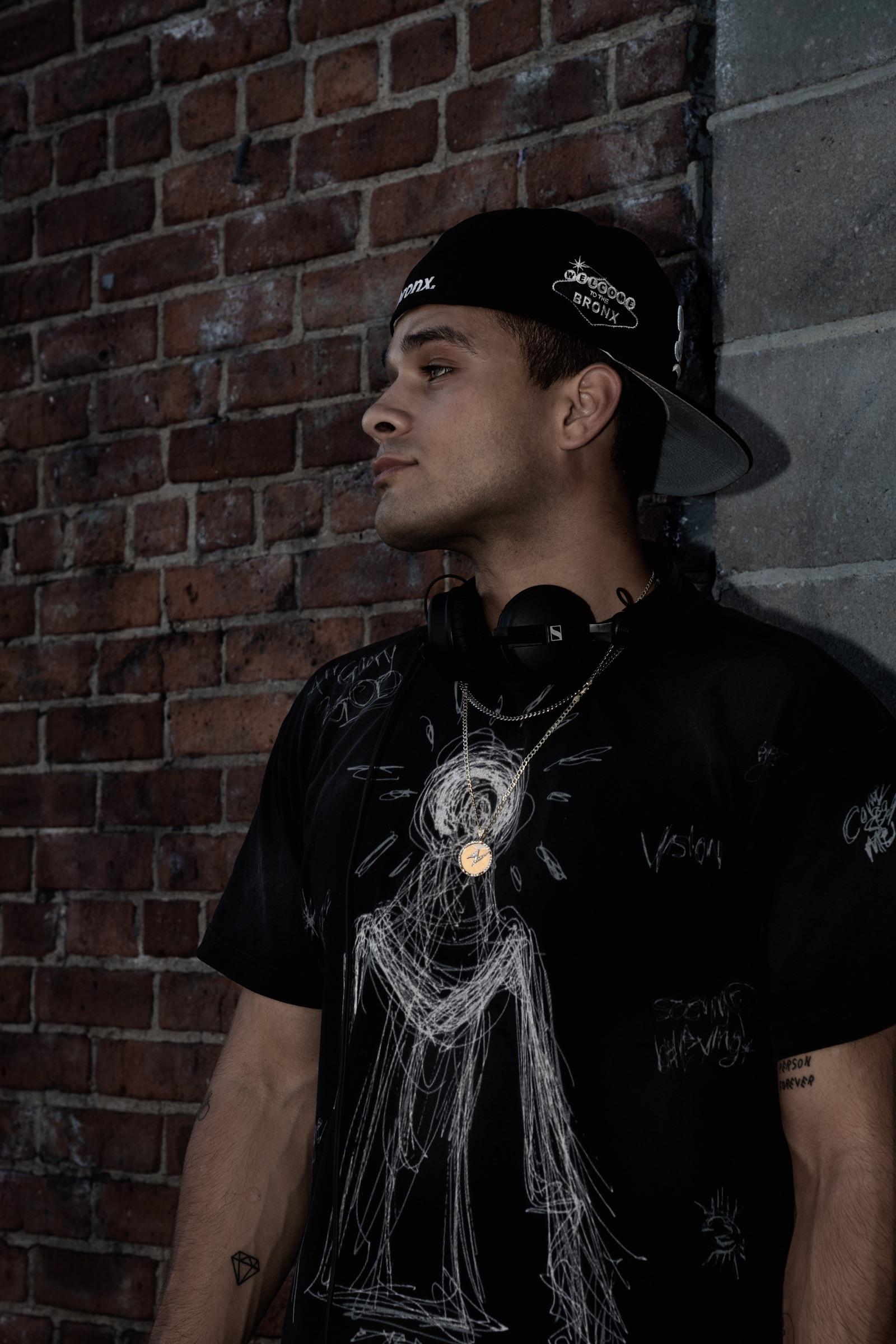 Artist looking away, headphones around the neck