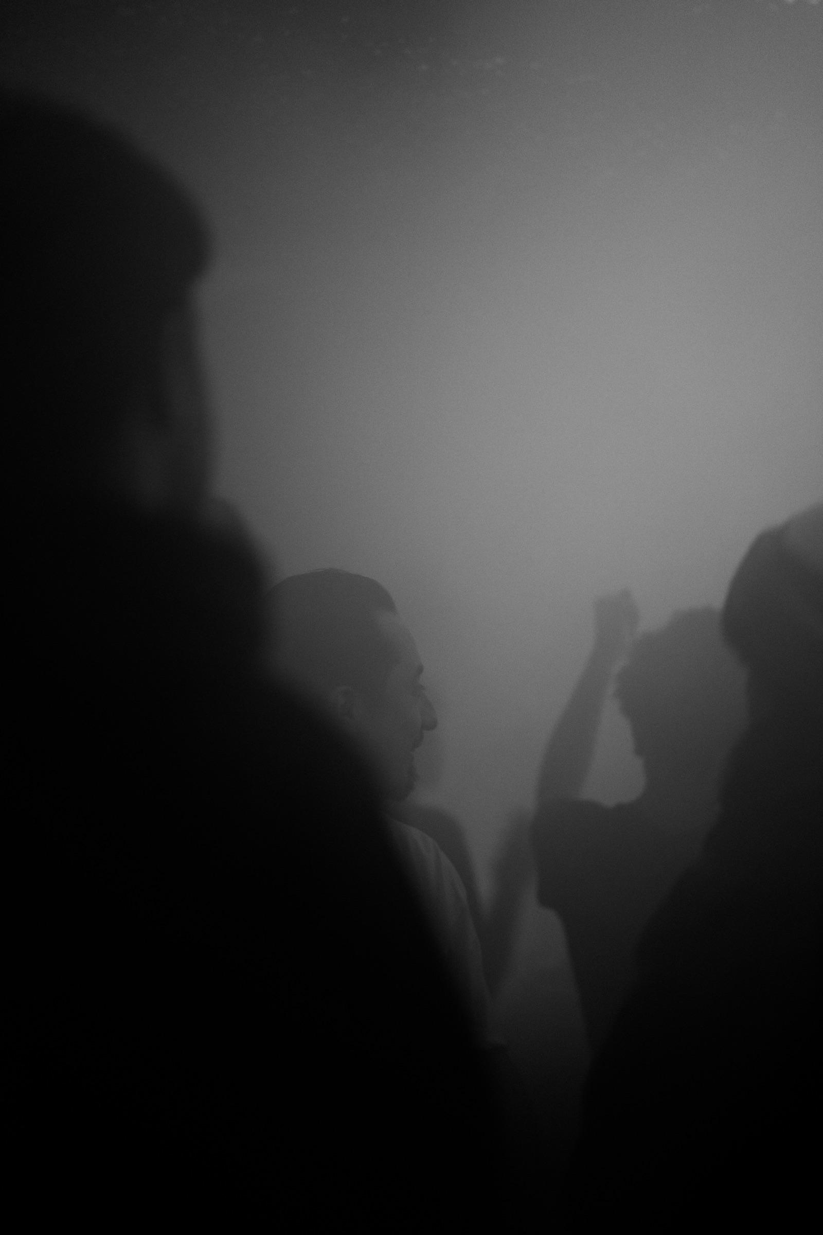 Blurred dancers in white fog